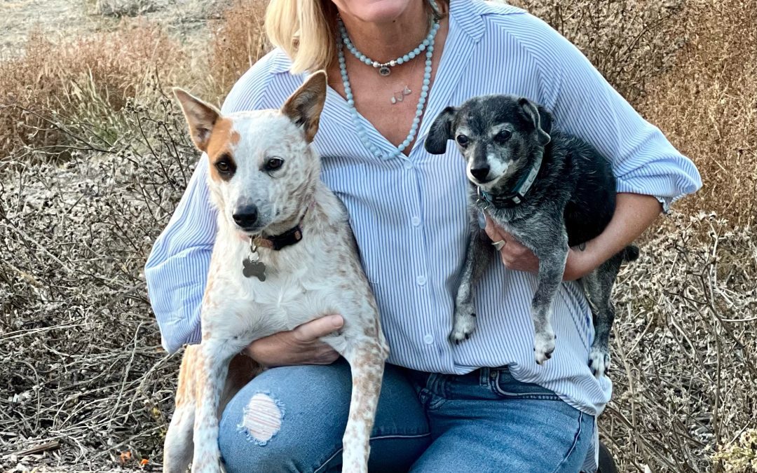 Executive Director Isabelle Gullö with two of her family pets